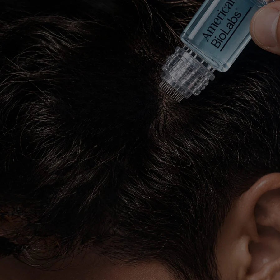 American BioLabs micro-infusion stamp being applied to the scalp